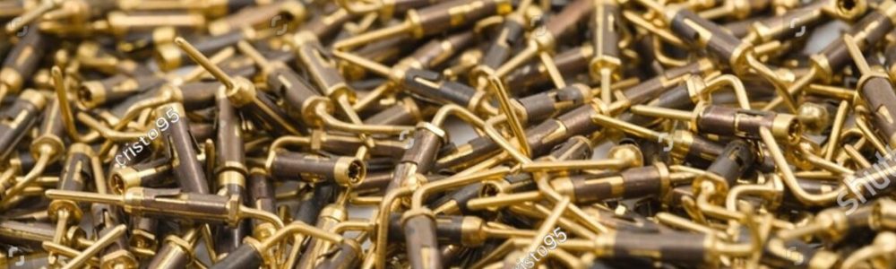stock-photo-close-up-of-gold-plated-frb-pins-used-as-electronic-connectors-showing-detail-of-precision-2676885581