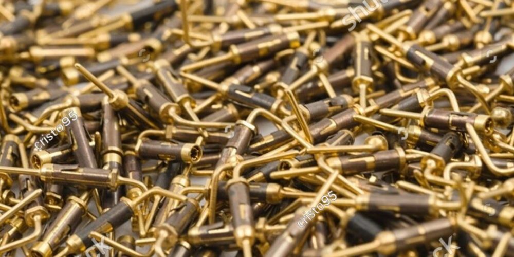 stock-photo-close-up-of-gold-plated-frb-pins-used-as-electronic-connectors-showing-detail-of-precision-2676885581